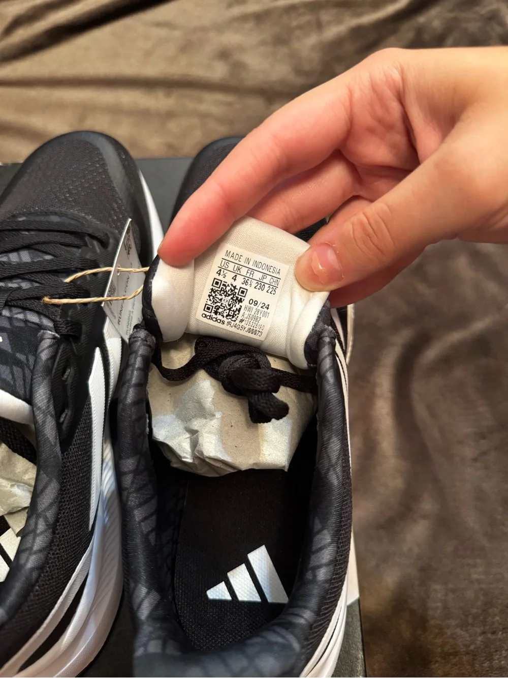 adidas Black and White Kids Running Shoe with Signature Three Stripes